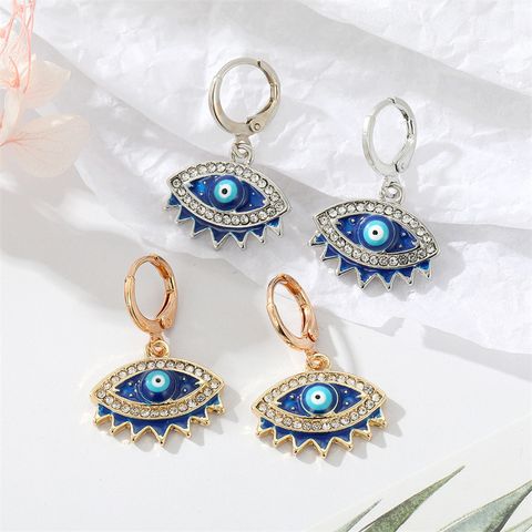 Fashion Retro Inlaid Rhinestone Turkish Eye Alloy Earrings