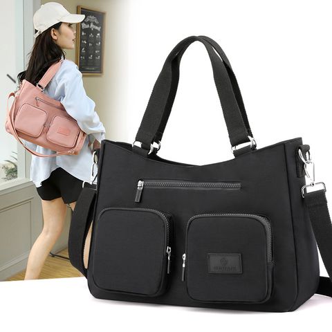 Unisex Streetwear Solid Color Nylon Travel Bags
