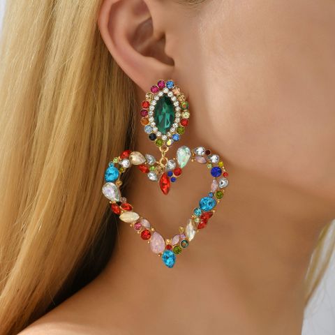 1 Pair Exaggerated Romantic Heart Shape Plating Inlay Zinc Alloy Rhinestones Glass Dangling Earrings