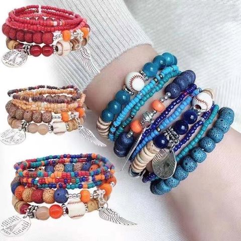 Casual Simple Style Round Wings Alloy Plastic Seed Bead Beaded Plating Unisex Bracelets