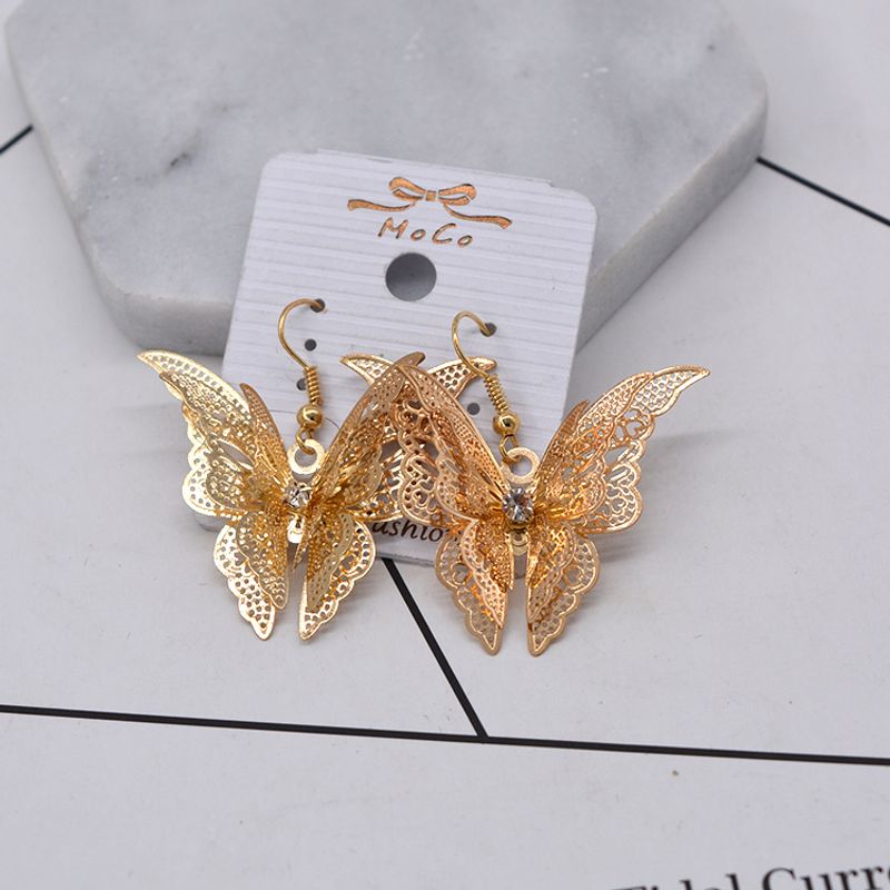 2018 Rétro Multi-niveau Creux Papillon Balancent Boucles D'oreilles Baroque Métal Simplicité Papillon Femmes De Boucles D'oreilles En Gros