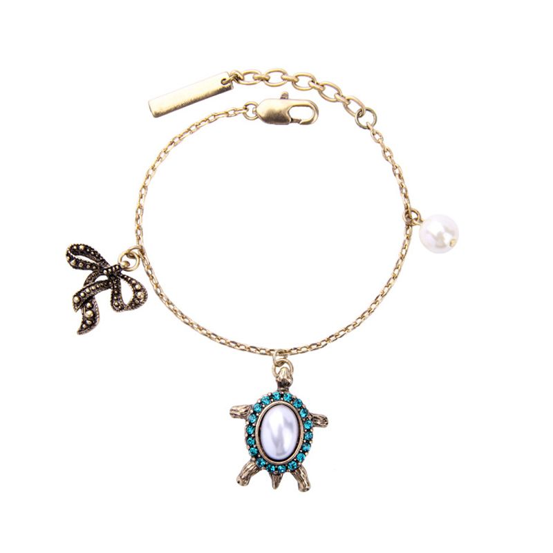 Vintage Alliage Perle Tortue Diamant Arc Femmes De Bracelet Européen Et Américain De Mode Croix-frontière Vendu Usine De Bijoux En Gros