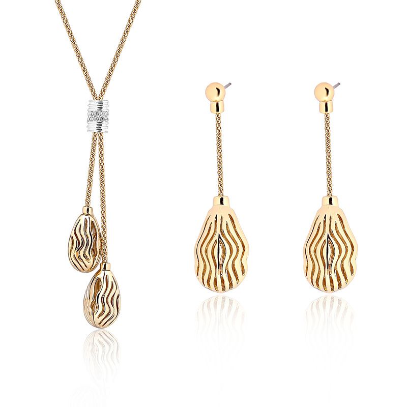 Creative Nouveau Cristal Autrichien Creux Texture Goutte D'eau Pendentif Boucles D'oreilles Bijoux Collier Deux-pièce Ensemble En Gros