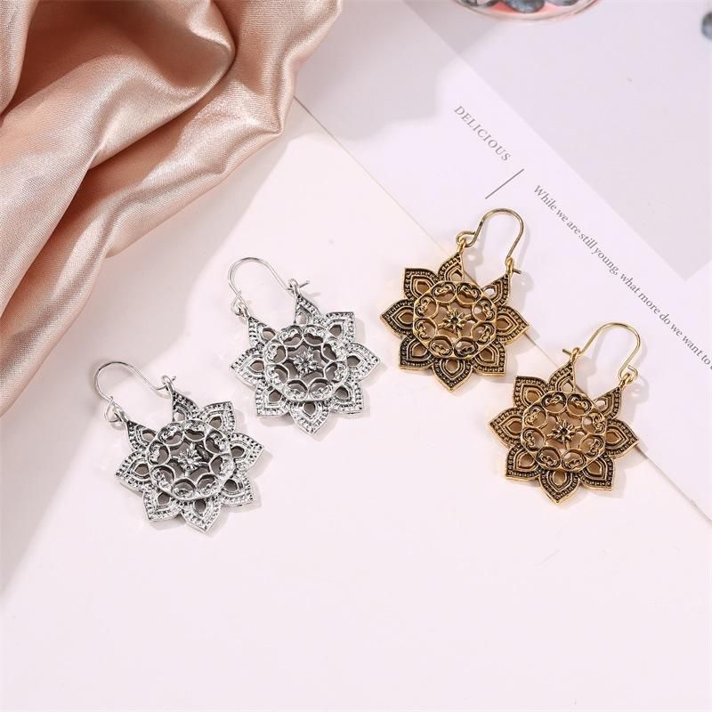 Vintage Openwork Flower Metal Carved Earrings Nhdp157464