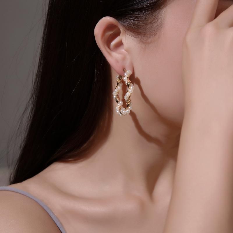 Fashion Wrapped Pearl Stud Earrings Nhdp157807