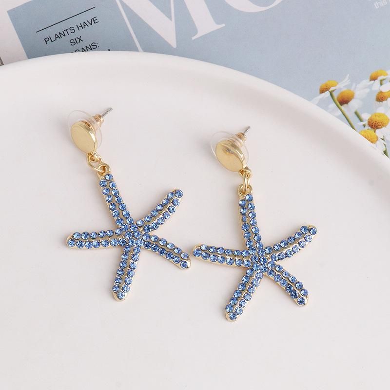 53028 Européen Et Américain Nouveau Boucles D'oreilles Boucles D'oreilles Femelle Étoiles De Mer Bleu Tous Les-match Élégant Pentagramme Indie Oreille Bijoux