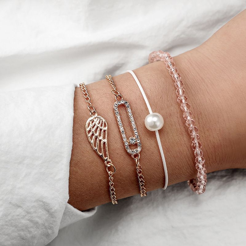 Europäische Und Amerikanische Grenz Überschreitende Neue Schmuck Mode Einfache Diamant Flügel Perlen Reis Perlen Seil Kombination 4-teiliges Armband