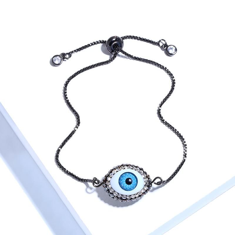 Européen Et Américain Oeil De Diable De Cuivre Incrusté Couleur Alliage De Zirconium Bracelet Blue Eye Bracelet De Femmes Simple Croix-frontière Nouvelle Arrivée Bra60