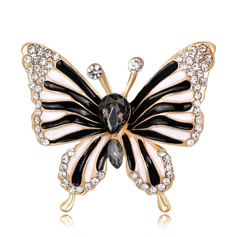 Nouvelle Européen Et Américain Populaire Ornement Noir Papillon Baisse De Pétrole Diamant Corsage Femelle Alliage Diamant Plaqué Kc Spot
