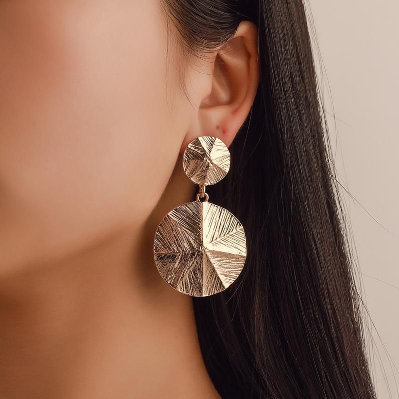 Stylish Metallic Geometric Round Texture Stud Earrings Nhdp145158