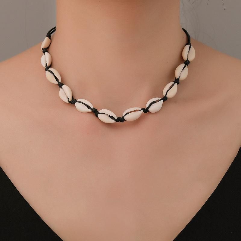 Vente Chaude En Europe Et Amérique Noir Noué Collier Plage Style Naturel Shell Collier De Femmes À La Main-tissé Collier Usine En Gros