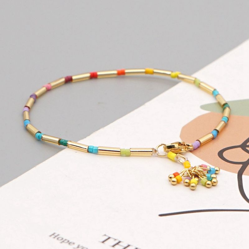 Bracelet De Perles De Pompon Tissé À La Main Arc-en-ciel Simple Créatif Avec Perles De Riz