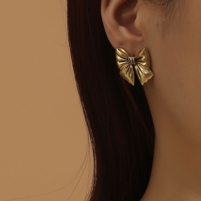 Retro Distressed Metal Bow  Korean Fashion Simple  Earrings