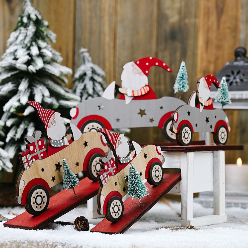 Santa Claus Driving With A Small Tree Ornaments