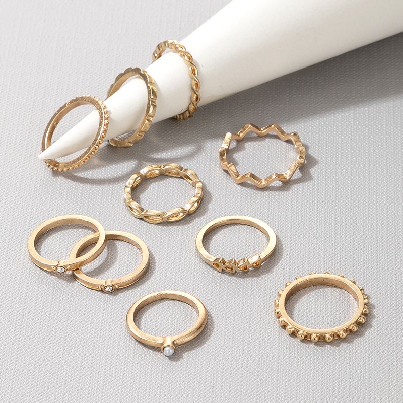New Fashion  Diamond And Pearl Hollow 9-piece Ring
