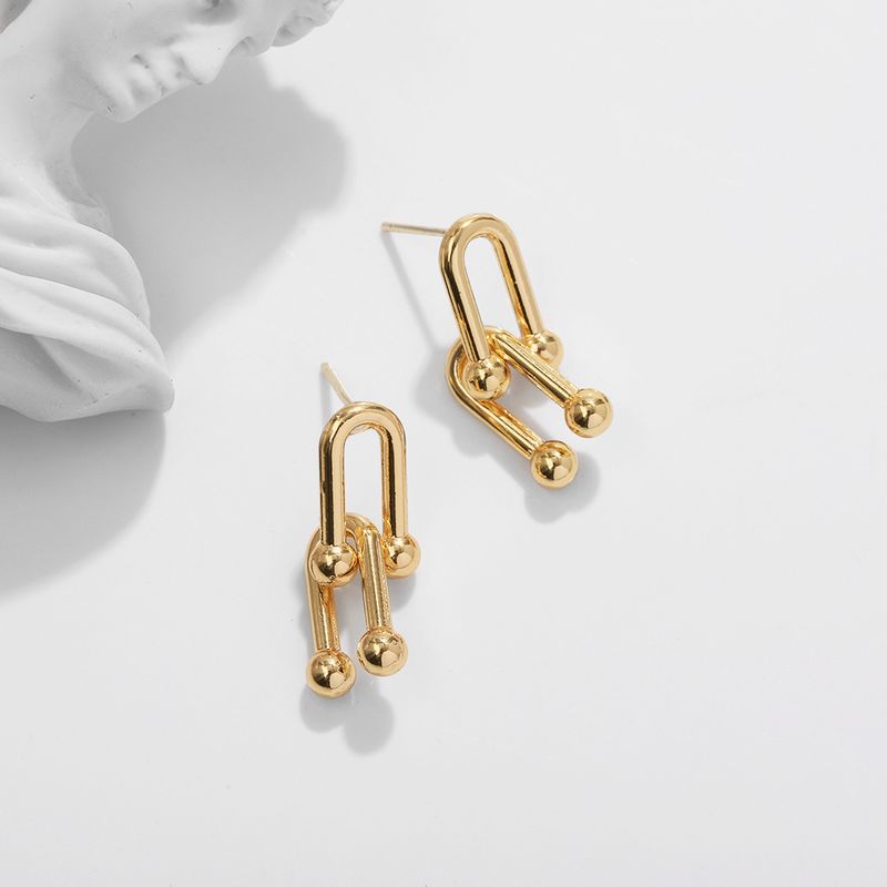 Golden Copper Inlaid Zirconium Earrings