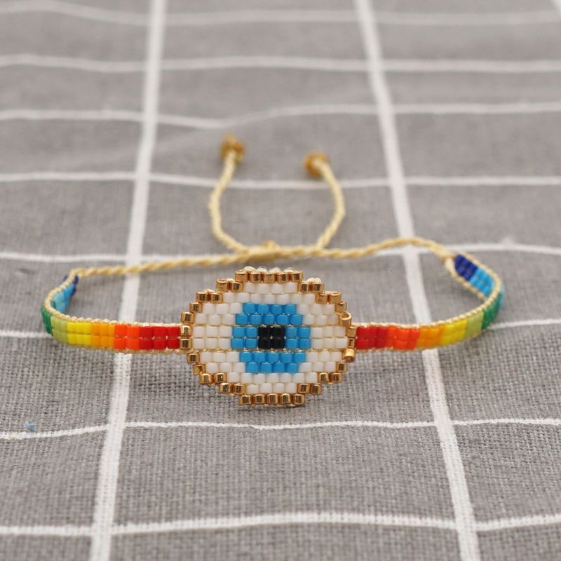 Pulsera Étnica Bohemia De Ojos Azules Turcos Tejida A Mano Con Arcoíris