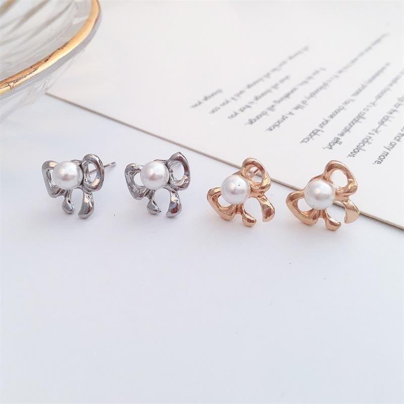 Korean New Boutique Ear Jewelry Wholesale Simple Pearl Bow Earrings Bow Tie Earrings