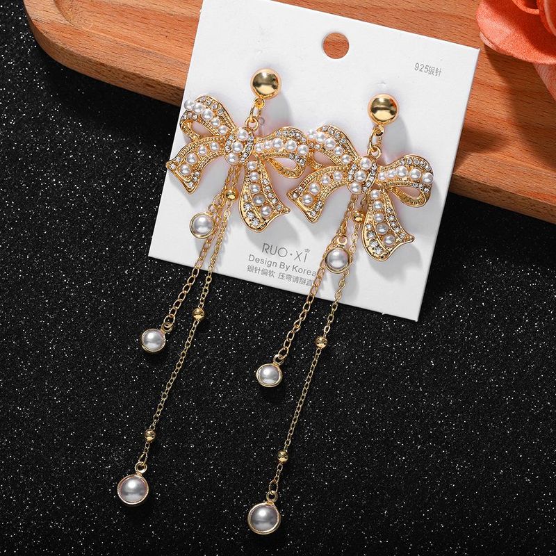 Korean Fashion Exquisite Bow Earrings Female New Chain Tassel Rhinestone Silver Needle Earrings