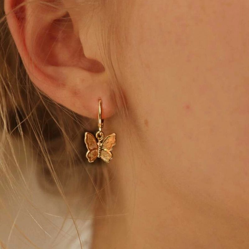 Korean Fashion New Butterfly Pendant Earrings Creative Retro Golden Frosted Metal Earrings Nihaojewely Wholesale