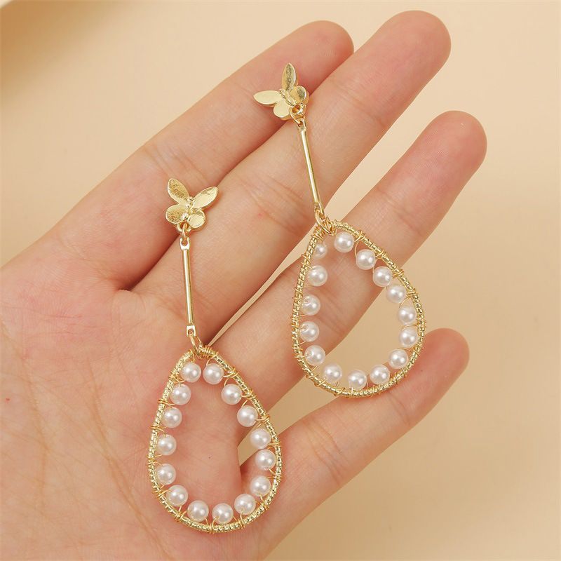 Mode Simple Tempérament Géométrique Goutte D'eau Perle Papillon Boucle D'oreille Tendance Coréenne Longue Boucle D'oreille Bijoux En Gros Nihaojewelry