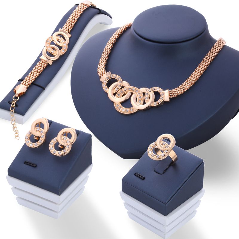 Joyería De Moda De Cinco Anillos Traje Collar Aretes Pulsera Anillo De Cuatro Piezas Al Por Mayor Nihaojewelry