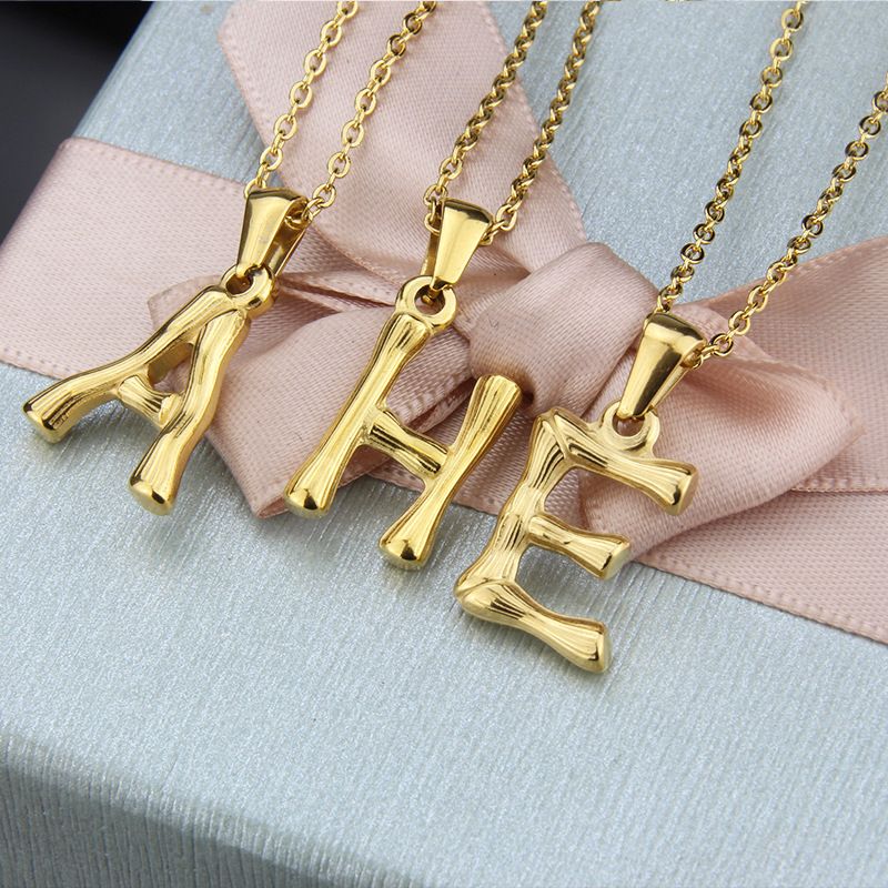 Platform New Stainless Steel Antique Slub-shaped 26 Letter Necklace Hot Gold English Titanium Steel Pendant Wholesale Nihaojewelry