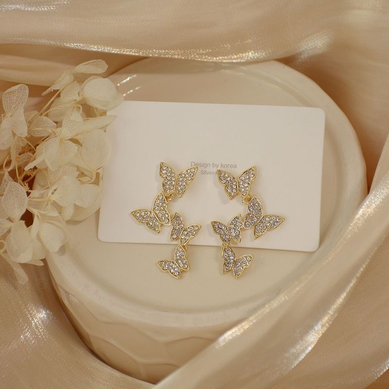 Korean Fashion Zircon Full Diamond Butterfly Tassel Earrings Super Fairy Senior People Earrings Wholesale Nihaojewelry