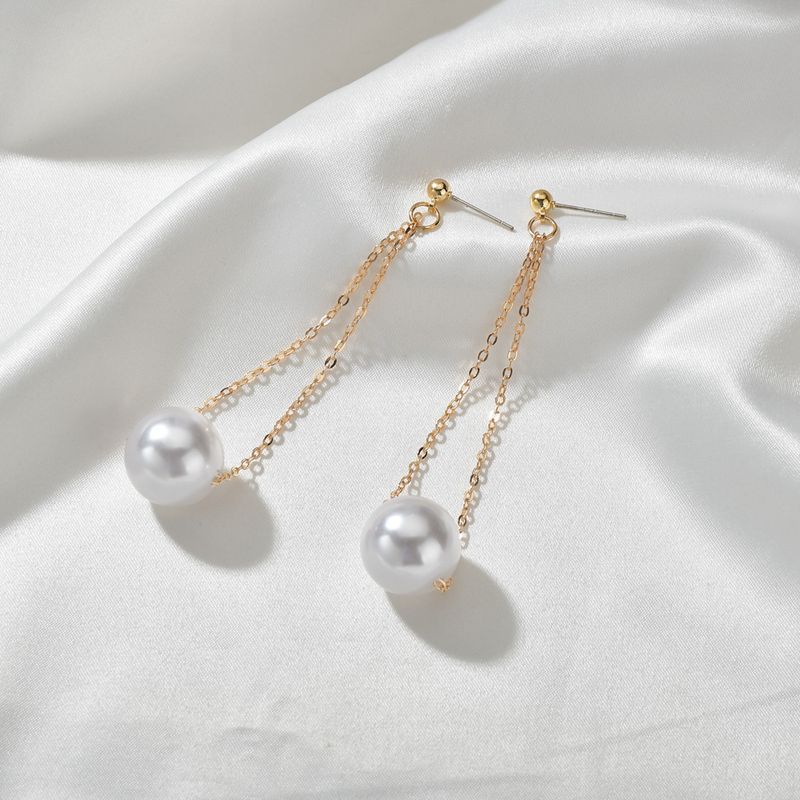 Simple  New Long Pearl Design Earrings Wholesale