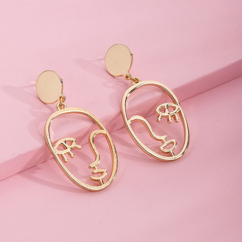 Europäischer Und Amerikanischer Stil Design Sinn Goldene Gesichts Kontur Ohrringe Weibliches Temperament Hohl Ohrringe Übertriebene Ohrringe Weiblicher Schmuck Großhandel
