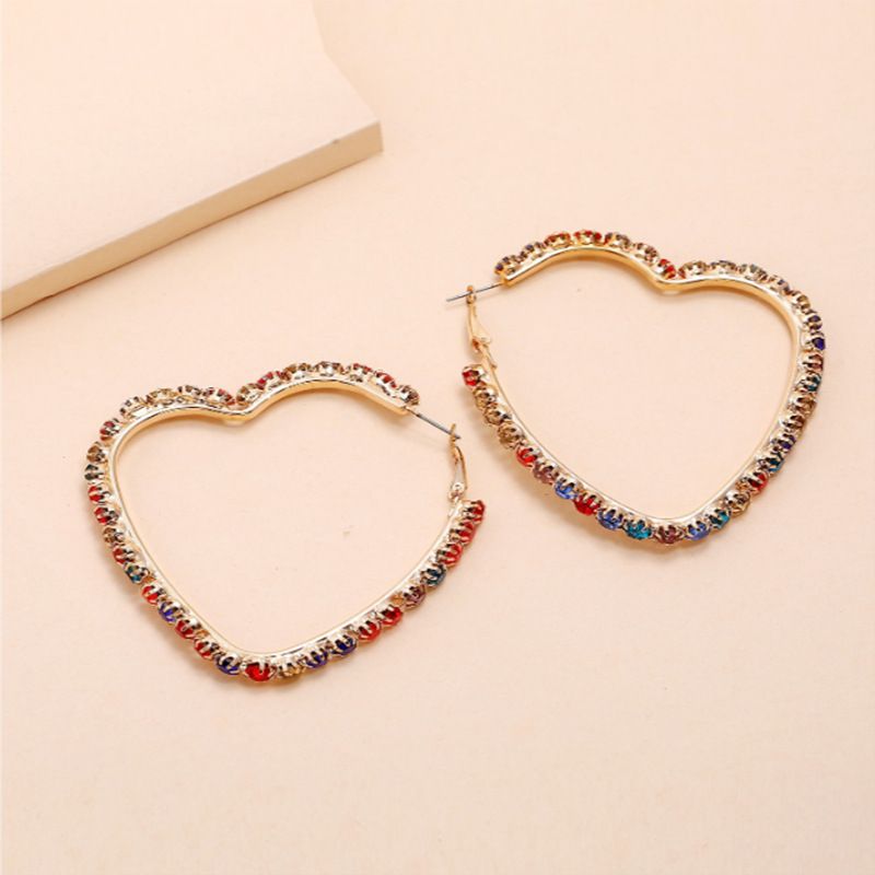 New Trend Exaggerated Wild Fashion Simple Retro Hollow Diamond Love Earrings