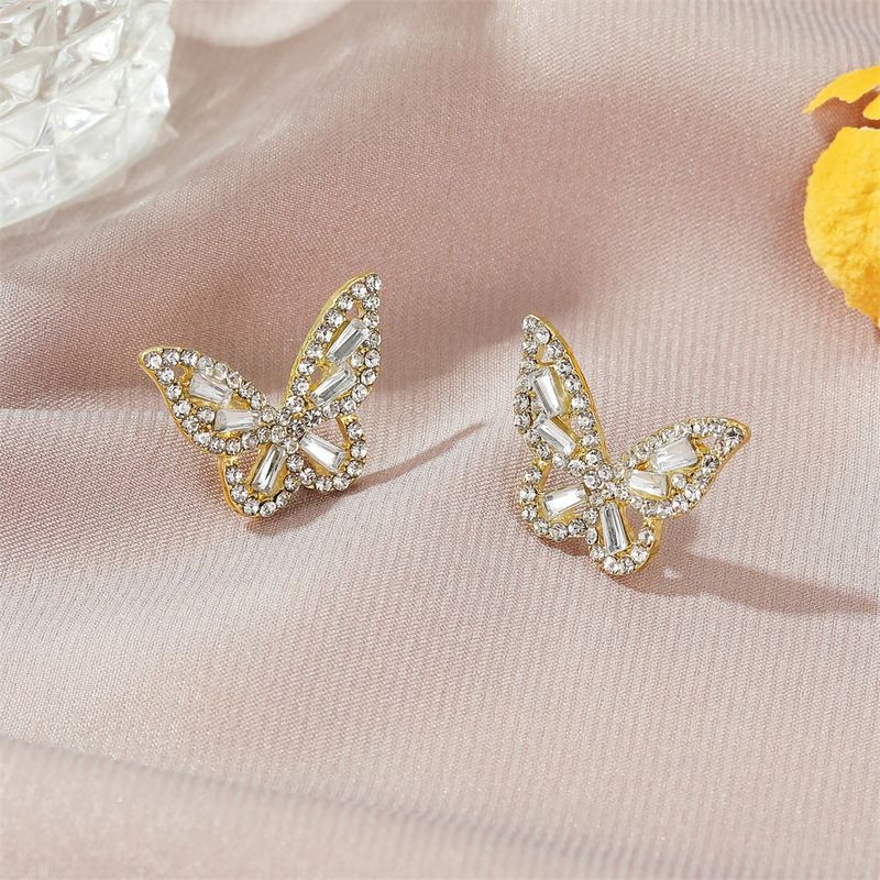 Nouvelle Mode Simple Zircon Papillon Dames Boucles D'oreilles En Alliage De Cristal Sauvage En Gros