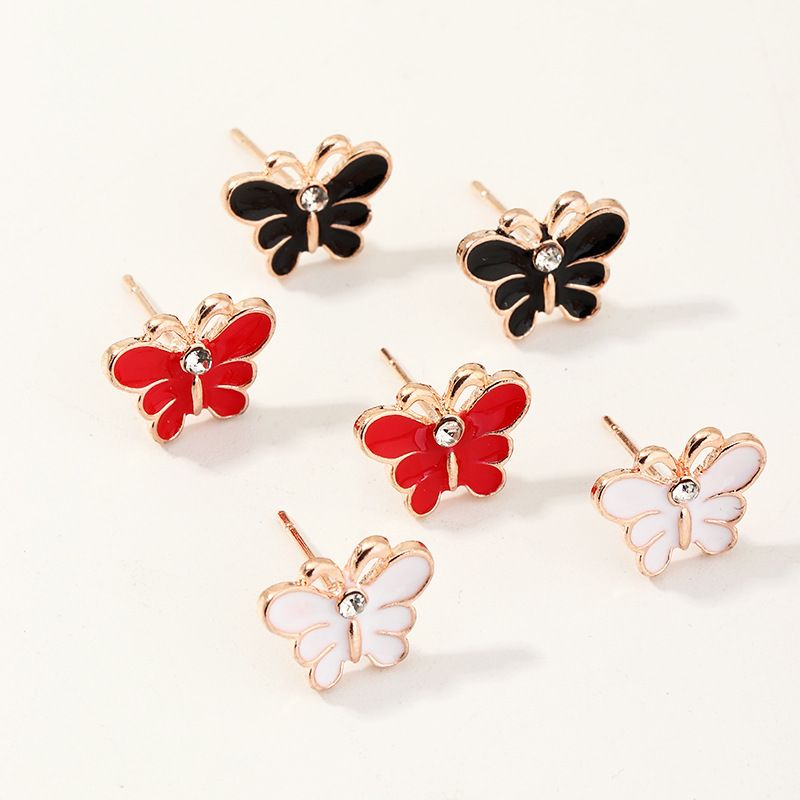 Korean Oil Drop Cartoon Butterfly Cute Pearl All-match Earrings Wholesale