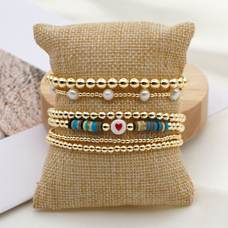 Fashion Trend Natural Pearl Soft Ceramic Multi-layered Beaded Imported Color-preserving Gold Bead Letter Bracelet
