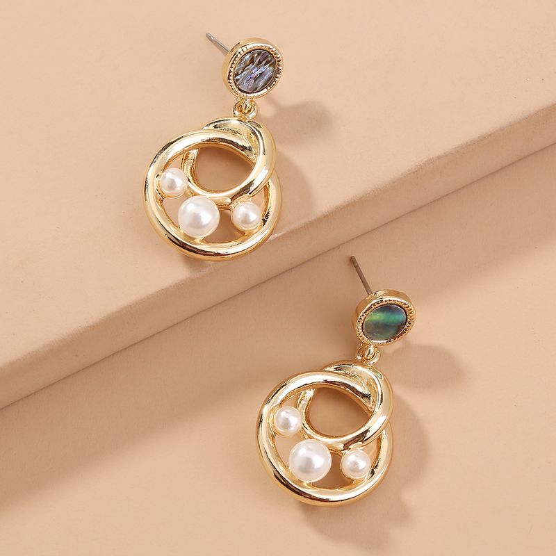 New Simple  Irregular Retro Simple Abalone Round Pearl Earrings Wholesale