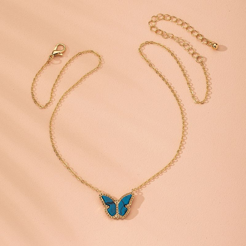 Nuevo Gradiente Mariposa Bosque Azul Pequeña Cadena De Clavícula Fresca Collar De Aleación De Mariposa Para Mujeres Al Por Mayor