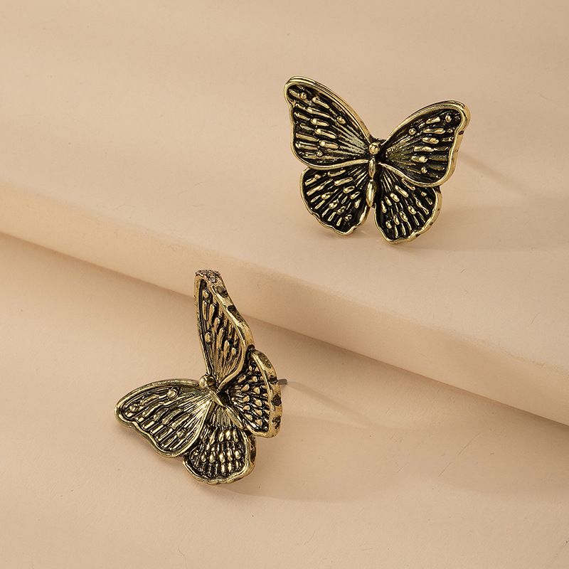 Mode Retro Schmetterling Charme Metalllegierung Ohrringe Für Frauen Großhandel