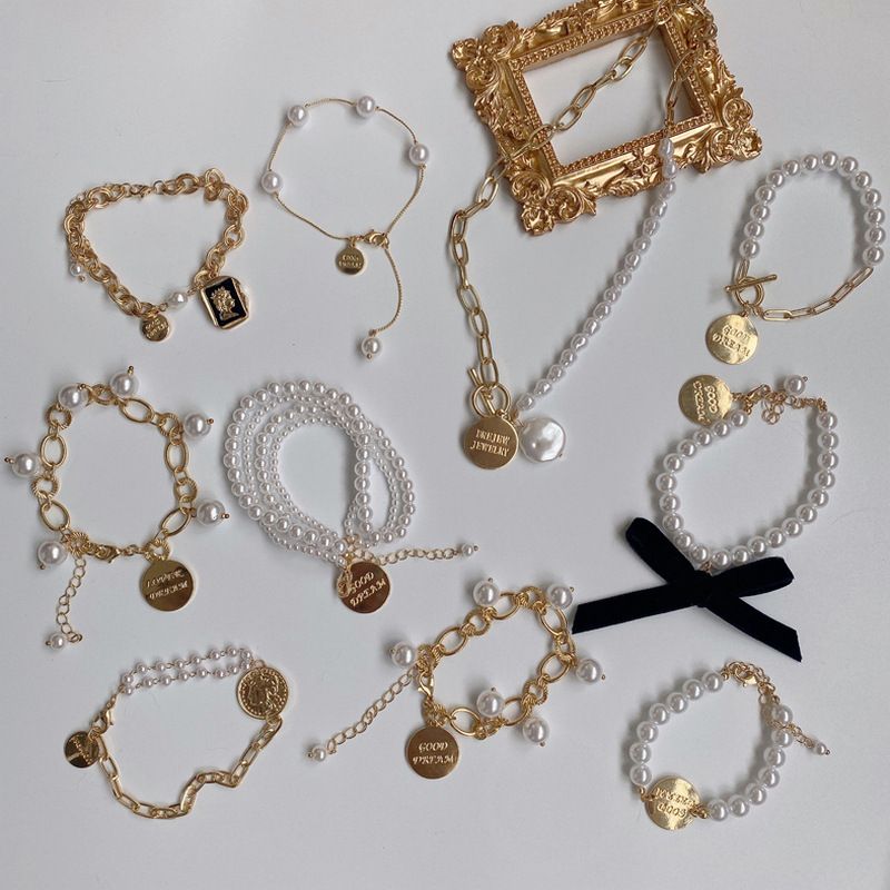 Retro Metallimitat Perle Person Kopf Rundes Markenarmband Halskette Elegantes Armband