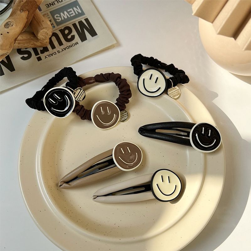 New Autumn And Winter Alloy Paint Dripping Oil Smiley Ponytail Hair Rope Side Clip Hair Accessories