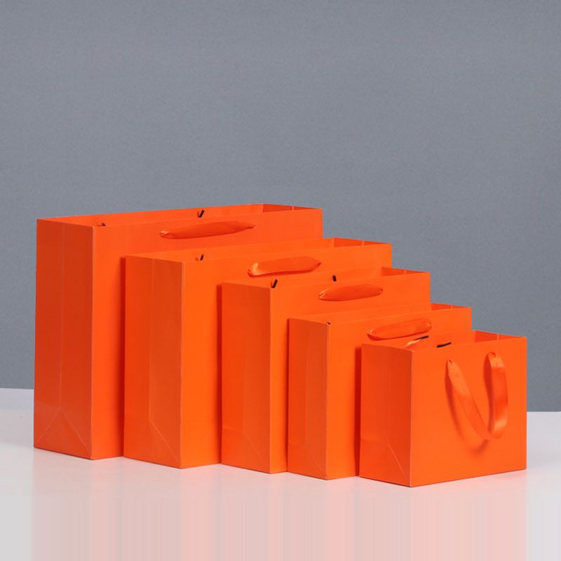 Orange Einkaufstasche Papiertüte Geschenktüte Kleidung Einkaufstasche Geburtstag Zurück Geschenkverpackung Kosmetik Lippenstift Geschenktüte