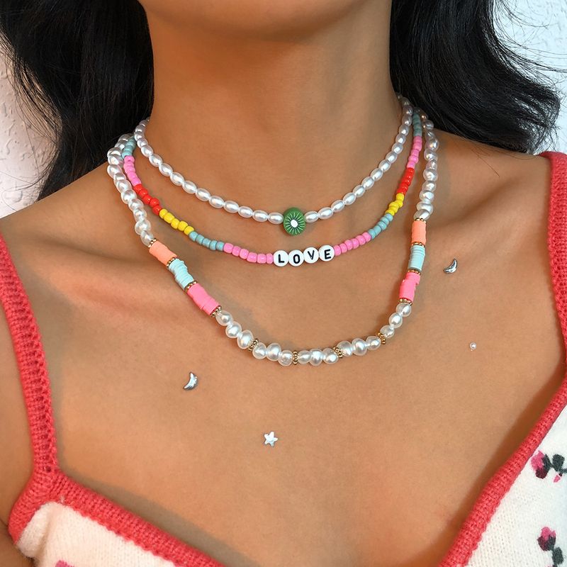 N9613 Europäische Und Amerikanische Mehr Schicht Ige Farbige Reis Perlen Halskette Geometrische Perlen Temperament Halskette Mode Persönlichkeit Kreative Halskette Frauen