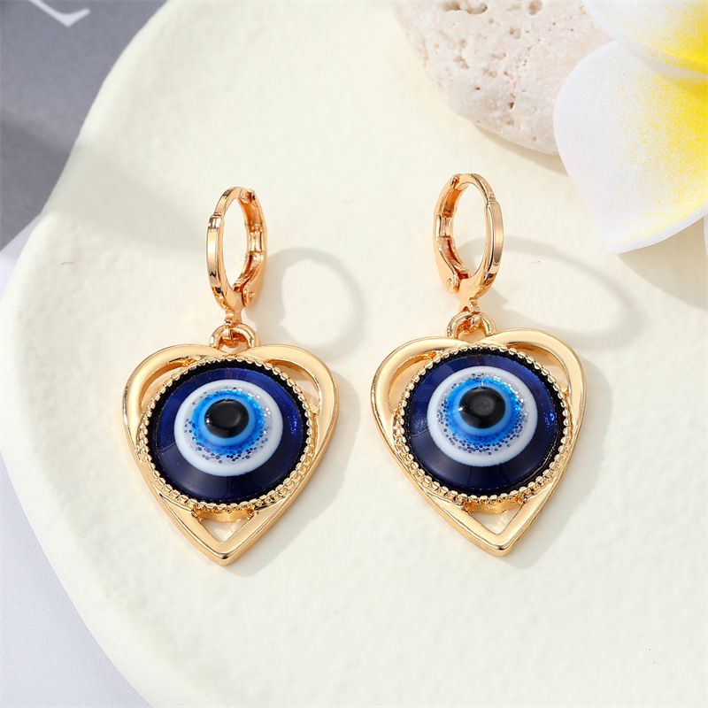 European Cross-border Sold Jewelry Retro Metal Heart Evil Eyes Earrings Personality Hollow Out Heart-shaped Eyes Ear Ring Women