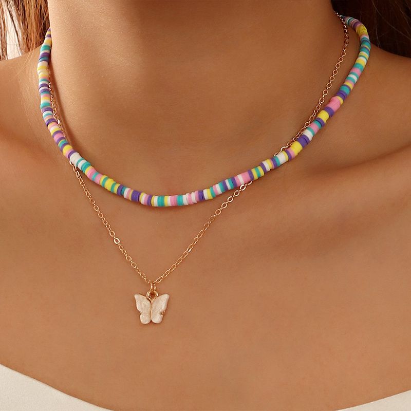 Joyería Nuevo Color Bohemio Grano De Arroz Doble Mariposa Colgante Collar Al Por Mayor