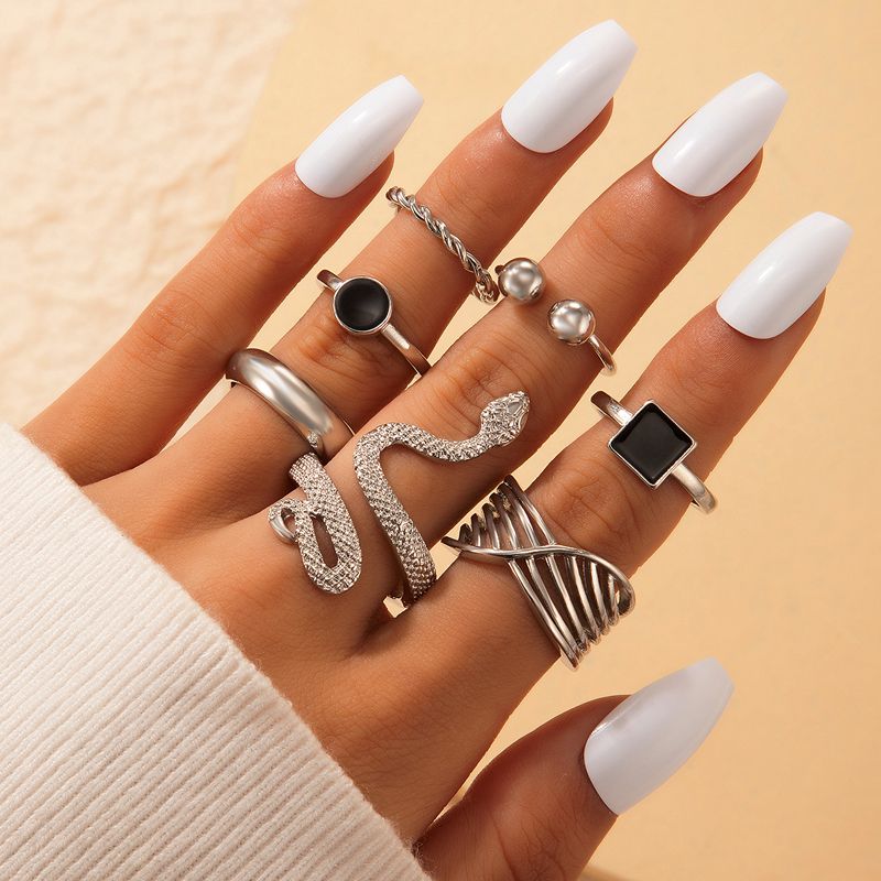 New Jewelry Simple Snake-shaped Retro Ethnic Style Black Drip Oil Zodiac Twist Ring Seven-piece Set