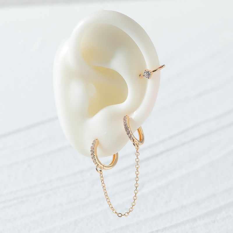 Qingdao Daiwei Europäischer Und Amerikanischer Modeschmuck Einfache Kupfer Eingelegter Zirkon Ohr Clip Kette Link Ohrringe Damen Einseitige Ohrringe
