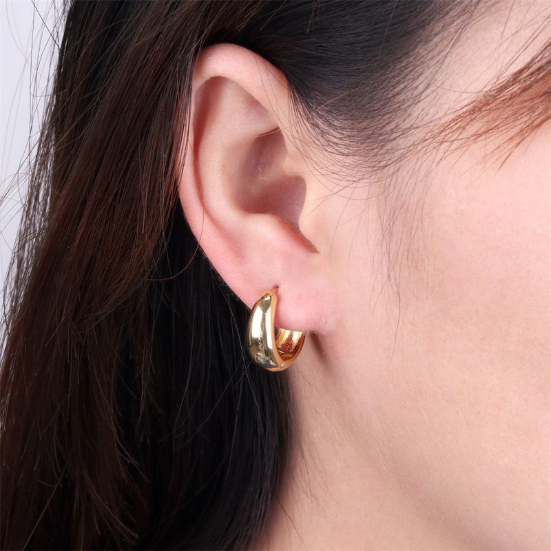 Wassertropfen Kreis Ohrringe Temperament Design Sinn Ohrring Einfache Kupfer Vergoldete Ohrschnalle Großhandel