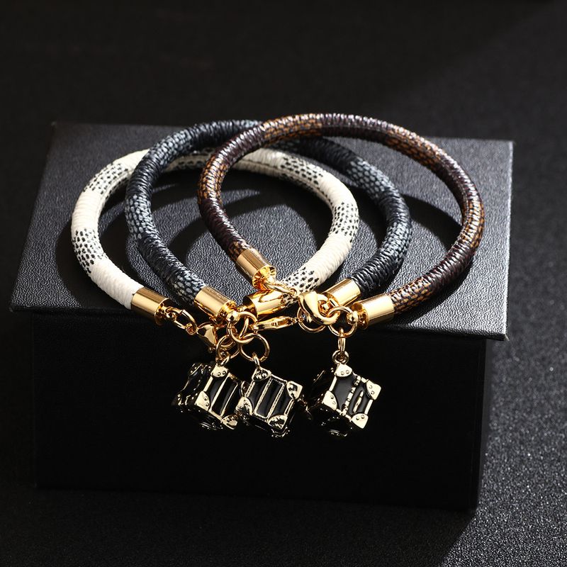 New Fashion Striped Bracelet Pu Leather Rope Electroplating Real Gold Copper Bracelet