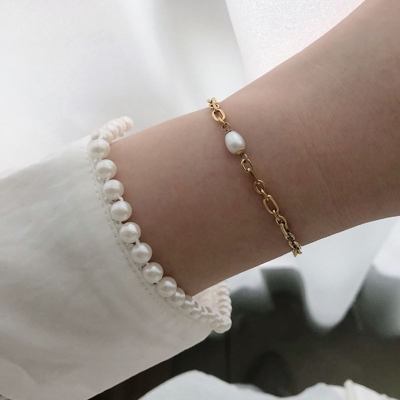 Bracelet En Acier Au Titane Avec Chaîne D&#39;épissage Ovale En Perles D&#39;eau Douce