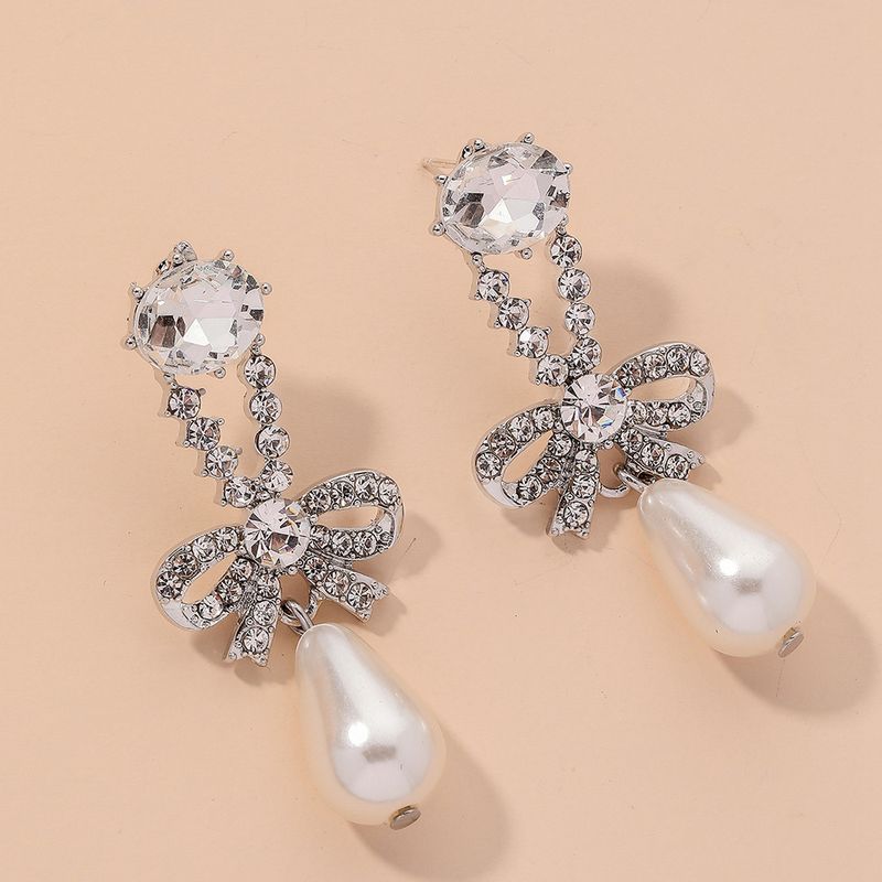 Diamond-studded Pearl Bowknot Earrings
