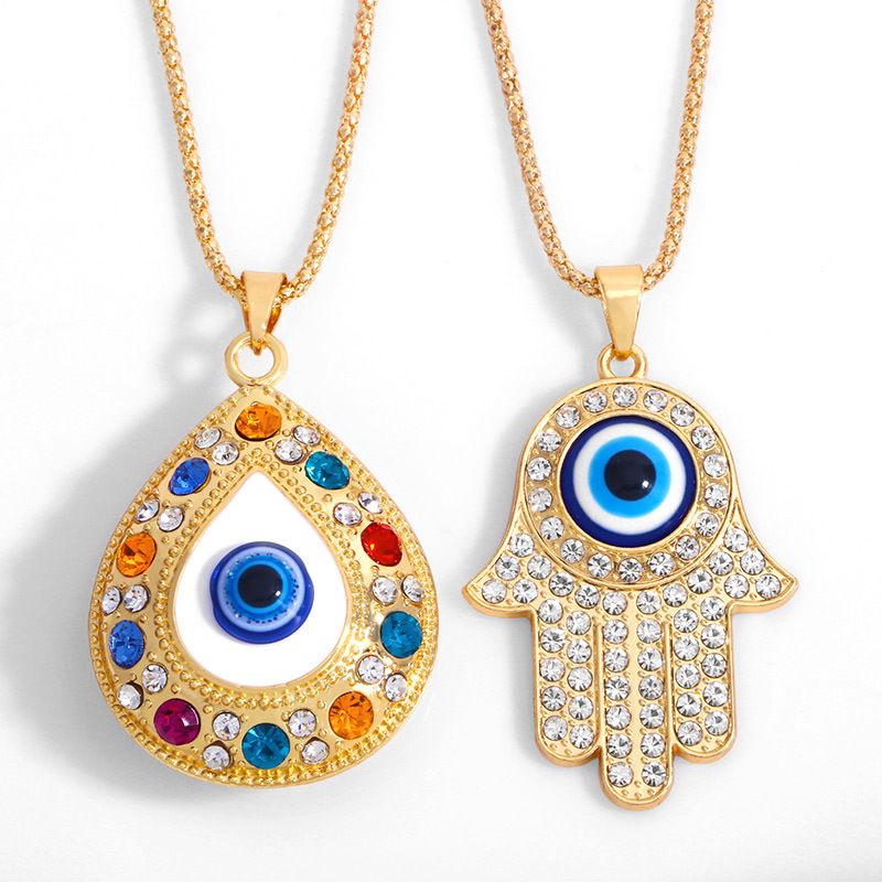 سبائك سريعة أوروبية وأمريكية قلادة يد فاطمة التركية ذات العيون الزرقاء سلسلة ملابس مجوهرات مرصعة بالماس Nkt61